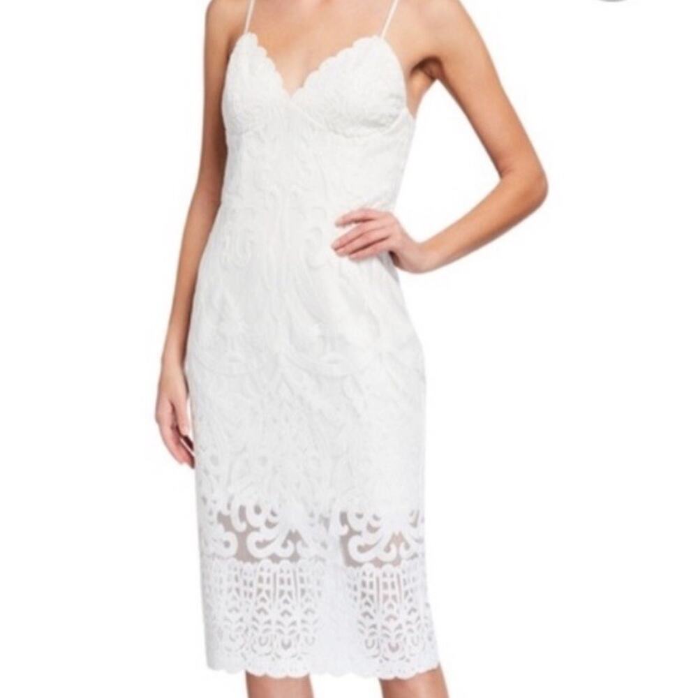 Bardot white lace midi dress Scalloped Vneckline with afitted sheath silhouette.